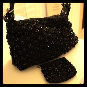 Black handbag with coin purse